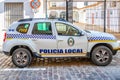 Trigueros, Huelva, Spain - August 13, 2020: Municipal police car, brand Dacia Duster, parked in front of Police office