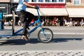 Trike in city traffic Royalty Free Stock Photo