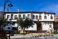 A traditional house and Ataturk Statue in Trilye. Bursa, Turkey