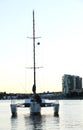 Trimaran anchored inside of a harbor Royalty Free Stock Photo