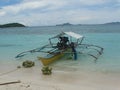 Trimaran at paradise tropical island beach, Coron, Philippines Royalty Free Stock Photo