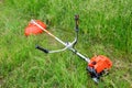 Trimer gascosis with leaf for mowing grass and shrubs Royalty Free Stock Photo