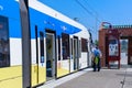 A Trimet light rail train heading through a city near Ruby Junction MAX station, Oregon Royalty Free Stock Photo