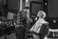 Trimming beard. Barbershop services. Excellent barber does not rush haircut. Visit hairdresser. Beauty routine Royalty Free Stock Photo