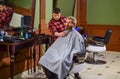 Trimming beard. Man client sit chair. Barbershop services. As gentleman and decent human being, you must tip your barber