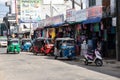 TRINCOMALEE, SRI LANKA - AUGUST 28, 2015: Tuk-tuks on the main street are a common way of transport Royalty Free Stock Photo