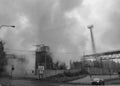 Trinec Iron and Steel Works with a lot of smoke around. View from car window.