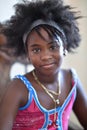 Trinidad, Cuba, August 15th, 2018: Little cuban girl posing at home