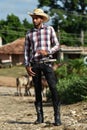 Trinidad, Cuba, August 16th, 2018: Man looking like cowboy walking on the streets of Trinidad