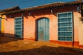 Trinidad, Cuba. Blue wooden grilles on Windows and doors. Local street in the old Cuban city.