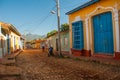 Trinidad, Cuba. Blue wooden grilles on Windows and doors. Local street in the old Cuban city.