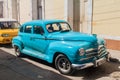 TRINIDAD, CUBA - FEB 8, 2016: Vintage Plymouth car on a street in the center of Trinidad, Cub