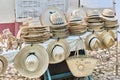 Souvenirs for tourists: straw hats, bags, toys handmade on street market in Trinidad, Cuba.