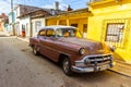 Old american car on street of Trinidad Royalty Free Stock Photo