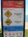 Trinity, Australia, 23-6-2014: a warning sign for the marine stingers and crocodiles in australia