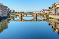 Trinity Bridge over river Arno at sunny day in Florence. Italy Royalty Free Stock Photo