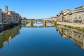 Trinity Bridge over river Arno at sunny day in Florence. Italy Royalty Free Stock Photo