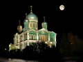 Trinity Cathedral in Diveevo on a full moon on an autumn night