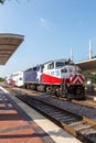 Trinity Railway Express TRE commuter train public transport portrait format at Union Station in Dallas, United States