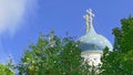 Trinity Sergius Lavra under blue sunny sky surrounded with ashberry trees