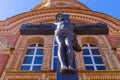 . Statue of the crucified Christ on the cross near the wall of the Cathedral of the Life-Giving Trinity. Orenburg region Royalty Free Stock Photo