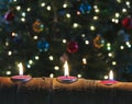 A Trio of Christmas Candles in an Aspen Log Royalty Free Stock Photo