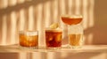 Elegant coffee cocktails in minimalist glassware on a warm background Royalty Free Stock Photo