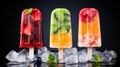A trio of colorful fruit popsicles standing upright in a glass. isloted on black Royalty Free Stock Photo