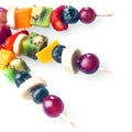 Trio of colourful tropical fruit kebabs Royalty Free Stock Photo