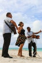 Trio ensemble performing on the beach, Cuba, Varadero