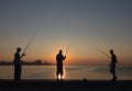 Trio of fishermen at sundown on Malecon in Havana Royalty Free Stock Photo