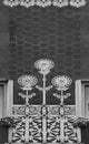 Trio flower detail on the main facade