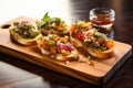 a trio of garden fresh bruschetta with authentic pickled jalapenos