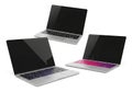A trio of modern laptops displayed with distinctive keyboard backlights Royalty Free Stock Photo