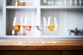 trio of rose wine glasses with varying shades from light to dark Royalty Free Stock Photo