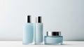 A trio of sleek cosmetic bottles with a minimalist design on a muted backdrop, perfect for branding