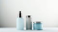A trio of sleek cosmetic bottles with a minimalist design on a muted backdrop, perfect for branding