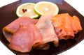 Trio of smoked fish on plate close up