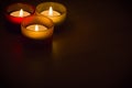 Trio of tea-lights with text space Royalty Free Stock Photo