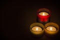 Trio of tea-lights with text space Royalty Free Stock Photo