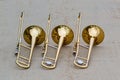 Trio of trombones taking a quick break Royalty Free Stock Photo