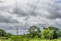 View with typical tropical landscape and electric tower and power lines, baobab and other trees and other types of vegetation, Royalty Free Stock Photo