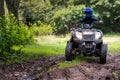 A trip on the ATV on the red road Royalty Free Stock Photo