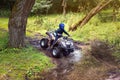 A trip on the ATV on the red road Royalty Free Stock Photo