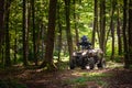 A trip on the ATV on the red road Royalty Free Stock Photo