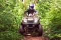 A trip on the ATV on the red road Royalty Free Stock Photo