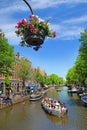 Trip through the picturesque canals of Amsterdam Royalty Free Stock Photo