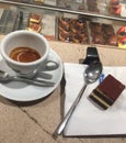 A trip to an Italian cafe requires a beautiful espresso served in a white mug along side the classic dessert Tiramisu