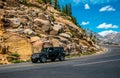 Trip to the wilds of Colorado. Car Jeep on a mountain road in the Rocky Mountains Royalty Free Stock Photo