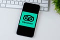 Tripadvisor app logo on a smartphone screen Royalty Free Stock Photo